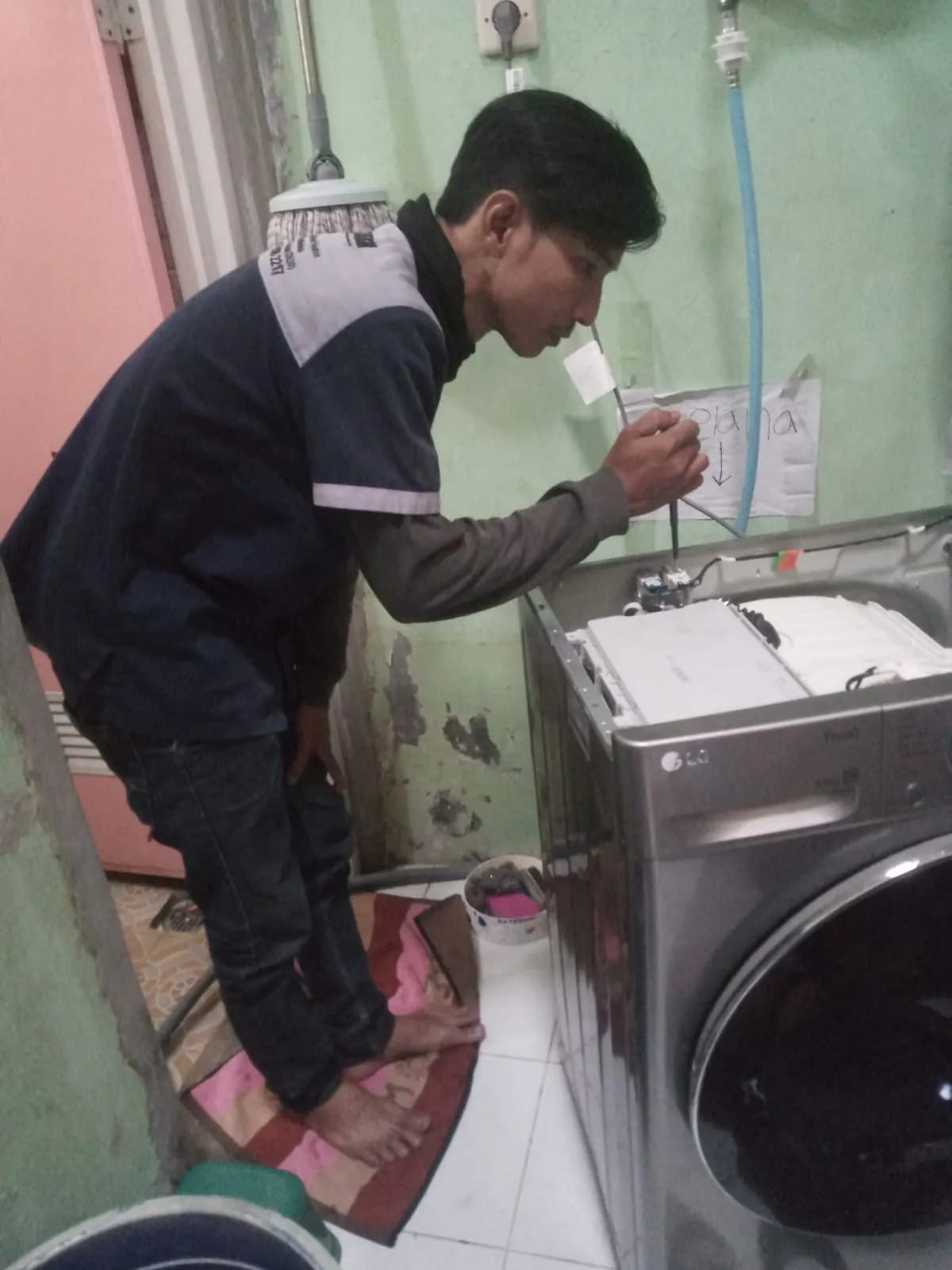 Service Mesin Cuci